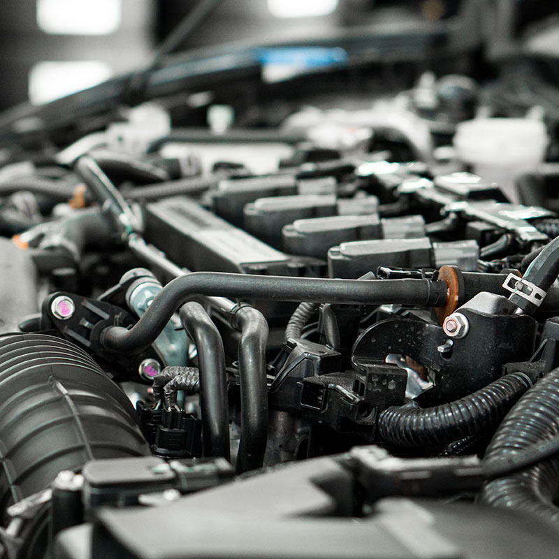Engine-bay-with-rubber-hoses-showing-mechanical-rubber-goods Engine-bay-with-rubber-hoses-showing-mechanical-rubber-goods