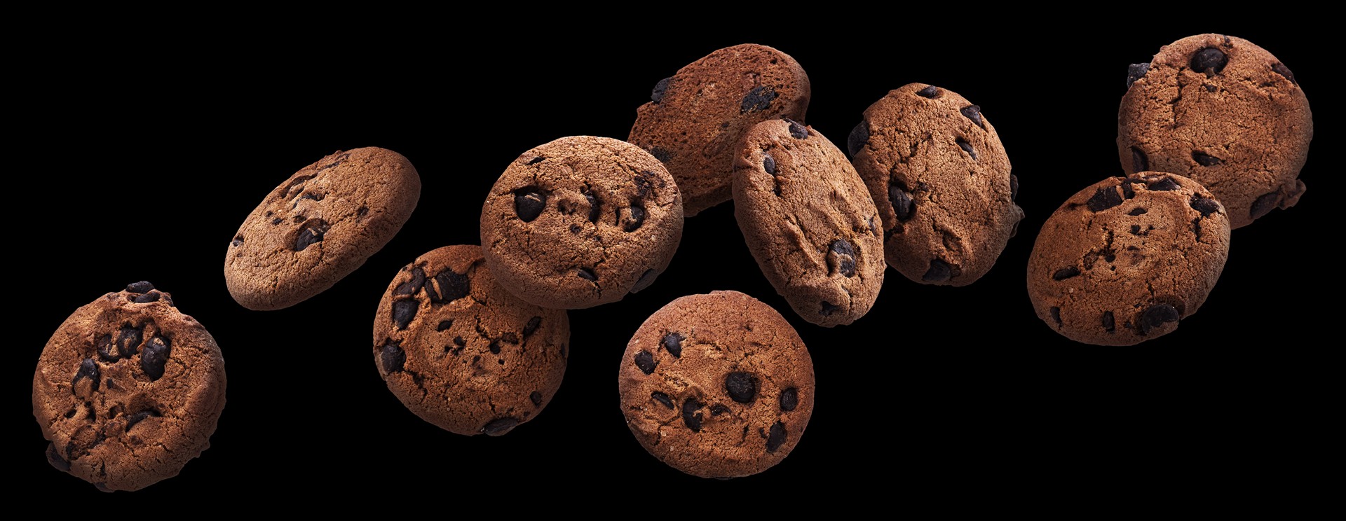 chocolate-chip-cookies-falling-black-background-flying-biscuits chocolate-chip-cookies-falling-black-background-flying-biscuits