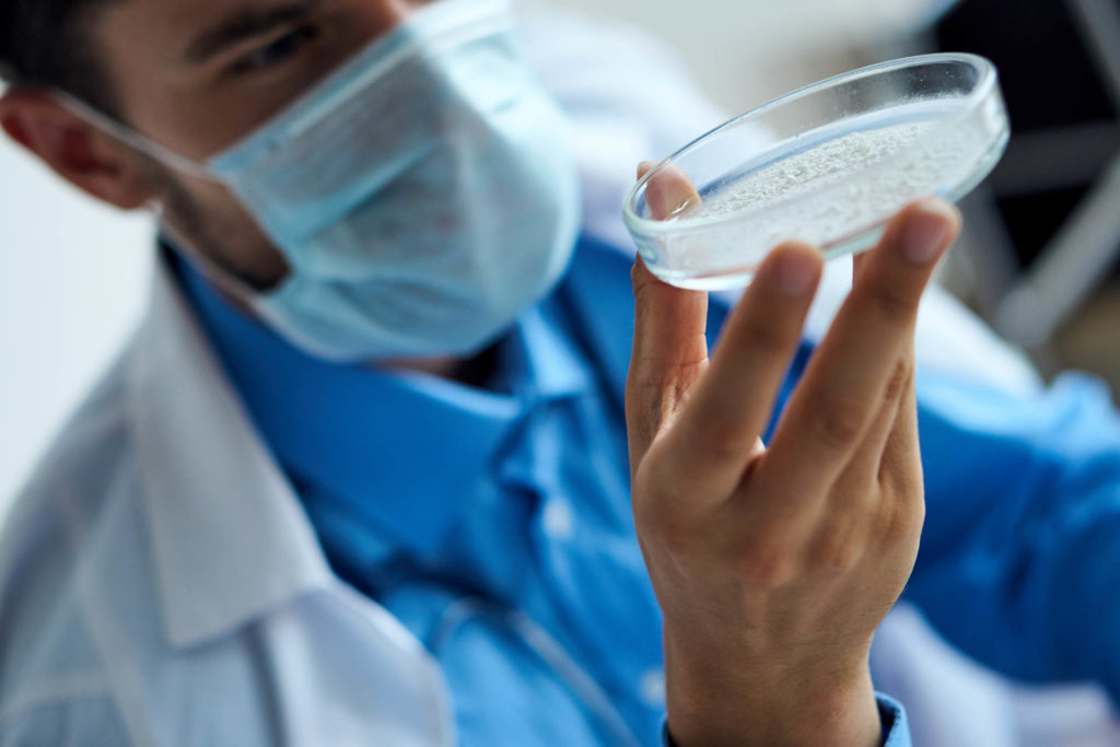 laboratory-technican-inspecting-silicon-dioxide-1024x683 laboratory technician inspecting a sample of silicon dioxide