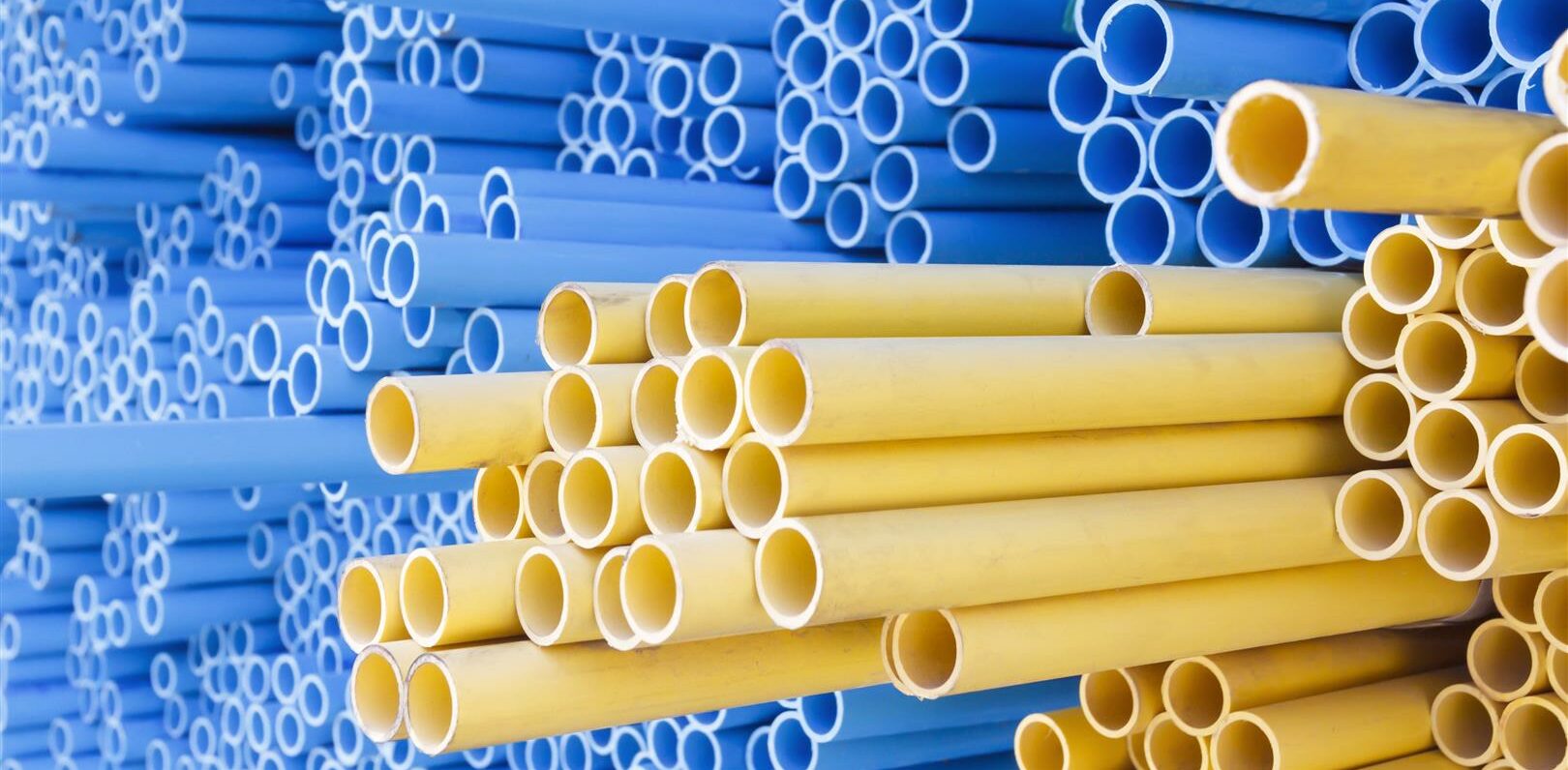 PVC pipes for electric conduit (yellow) and water (blue) PVC pipes for electric conduit (yellow) and water (blue)