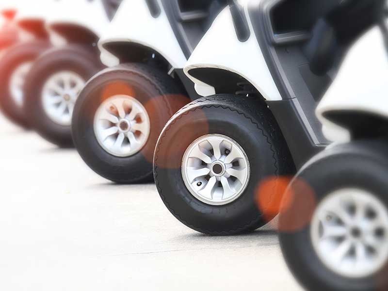 golf carts parked in line