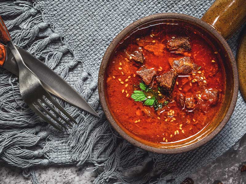 red beef stew in pot